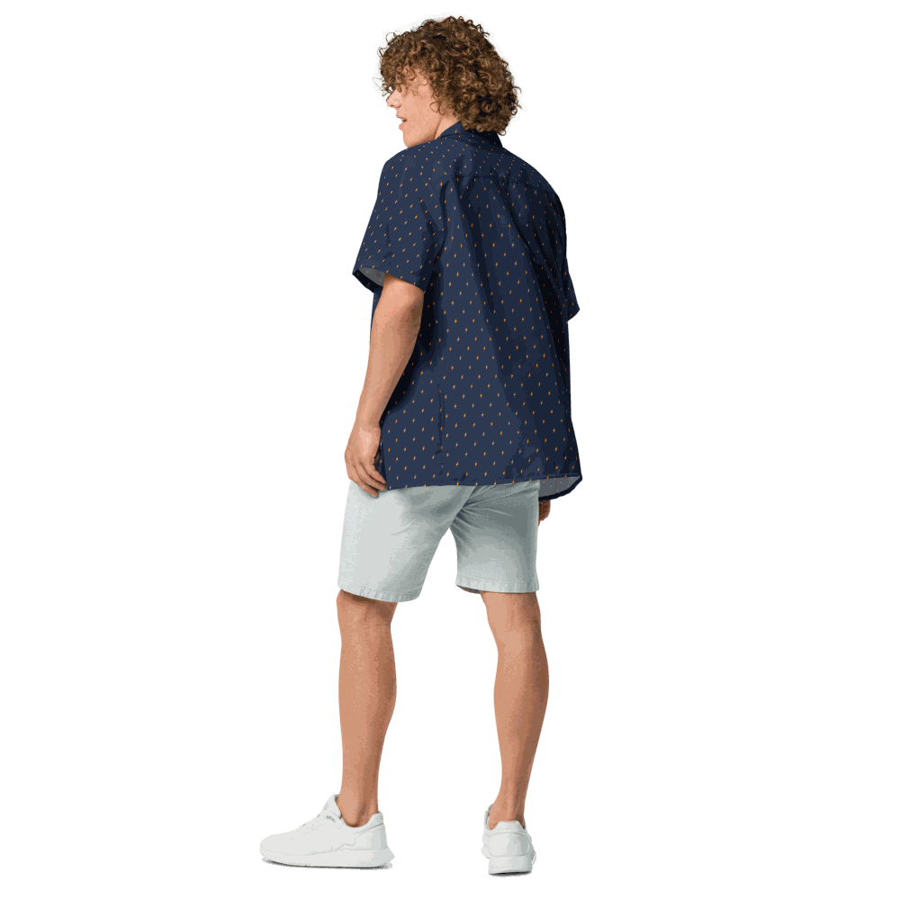 Back view of a man wearing a navy blue bitcoin button shirt.