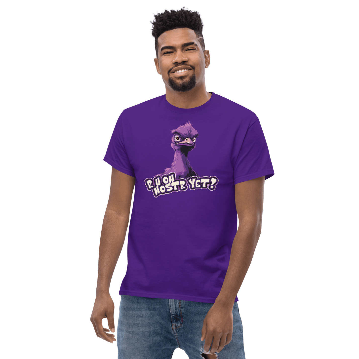 Front view of a guy wearing a purple nostr shirt.