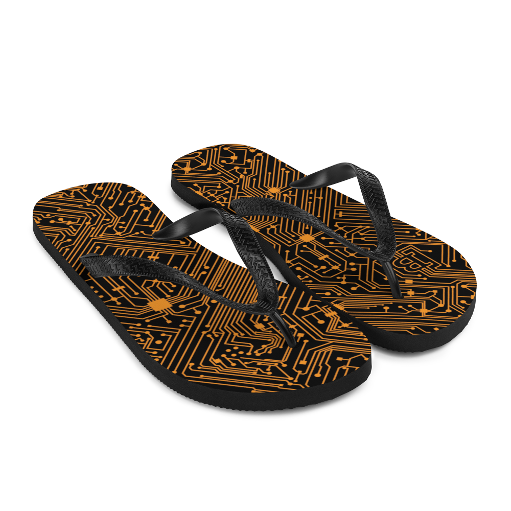 Side view of a pair of black bitcoin flip flops.