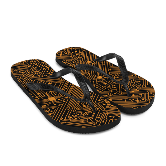 Side view of a pair of black bitcoin flip flops.