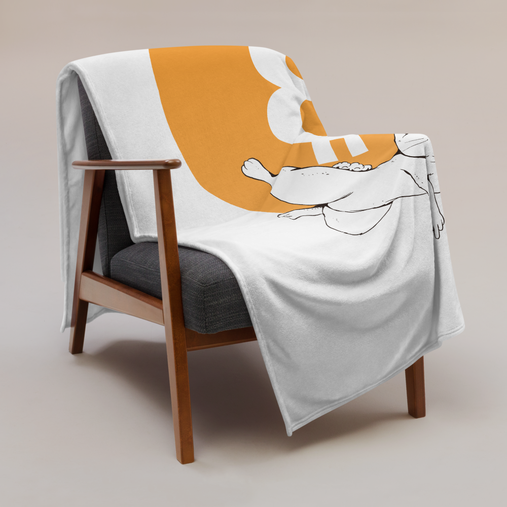 White bitcoin blanket hanging over an armchair.