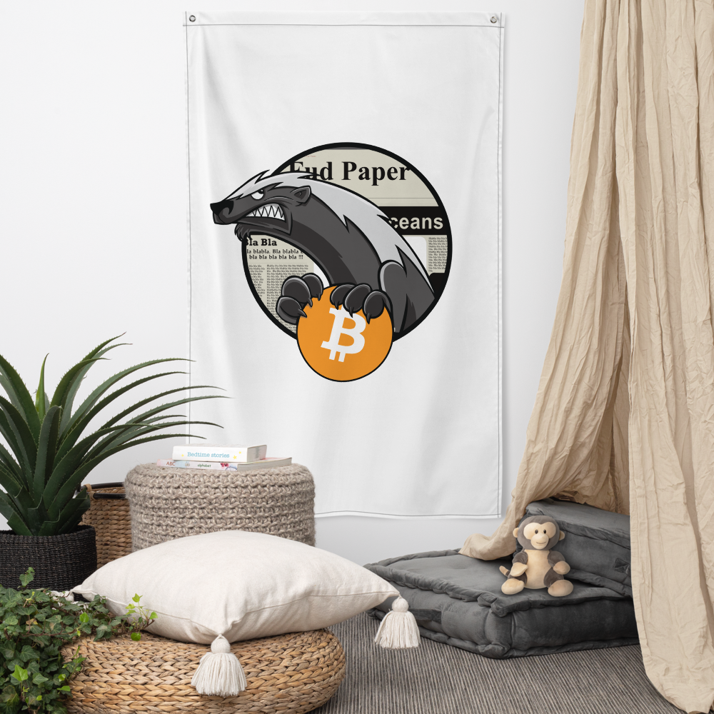 View of an white bitcoin flag hanging in a living room.
