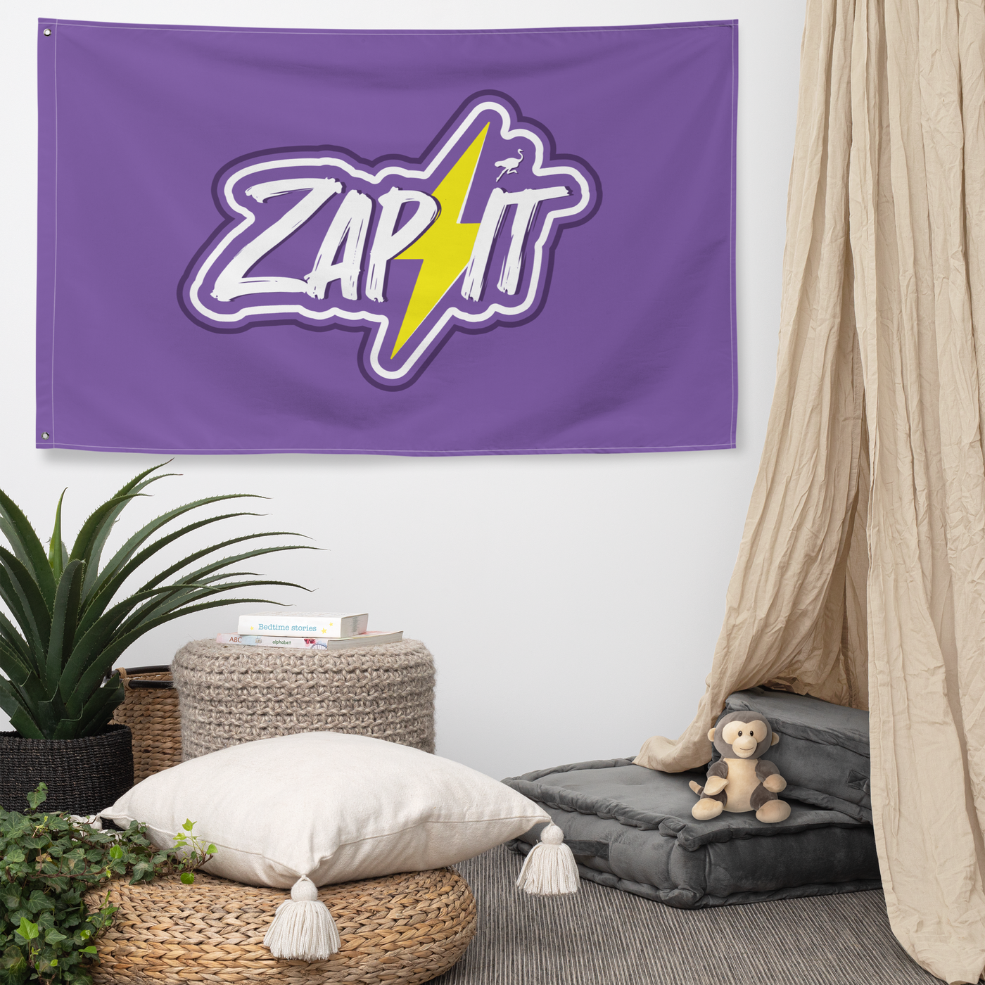Zap It nostr flag, hanging on a wall above a seating corner.