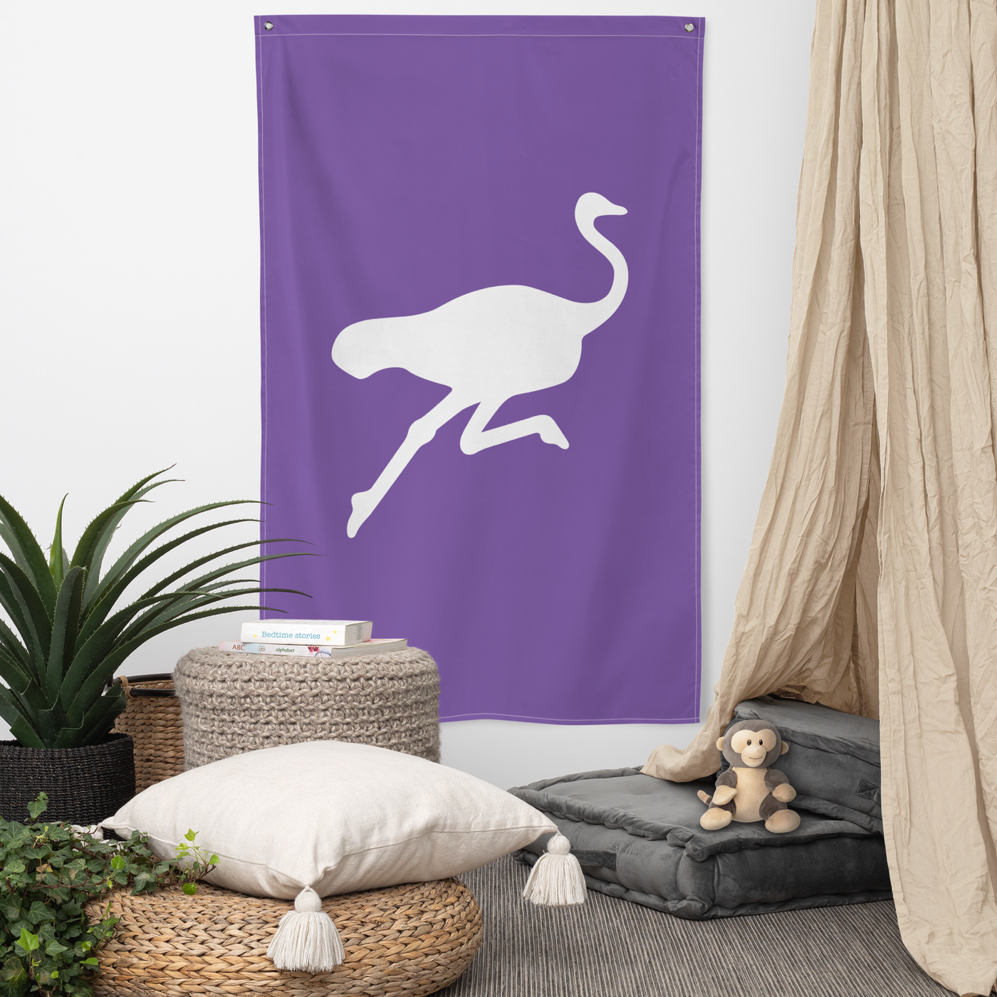 Nostrich nostr flag, hanging on a wall above a seating corner.