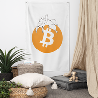 F*** Fiat Money bitcoin flag, hanging on a wall above a seating corner.