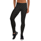 Front view of a woman wearing black bitcoin leggings.