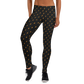 Front view of a woman wearing black bitcoin leggings.