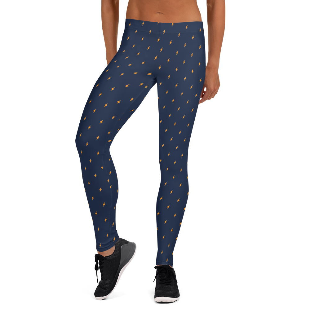 Front view of a woman wearing navy blue bitcoin leggings.