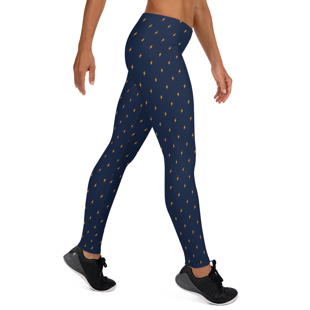 Side view of a woman wearing navy blue bitcoin leggings.