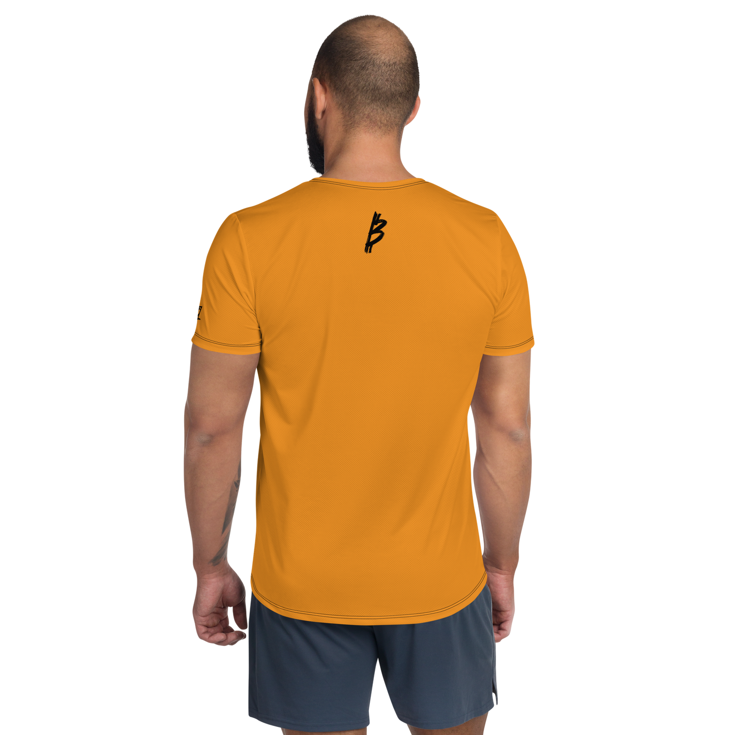 Back view of a man wearing an orange bitcoin athletic shirt for men.