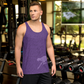 Front view of a man wearing a purple nostr tank top.