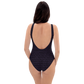 Back view of a woman wearing a black nostr swimsuit.