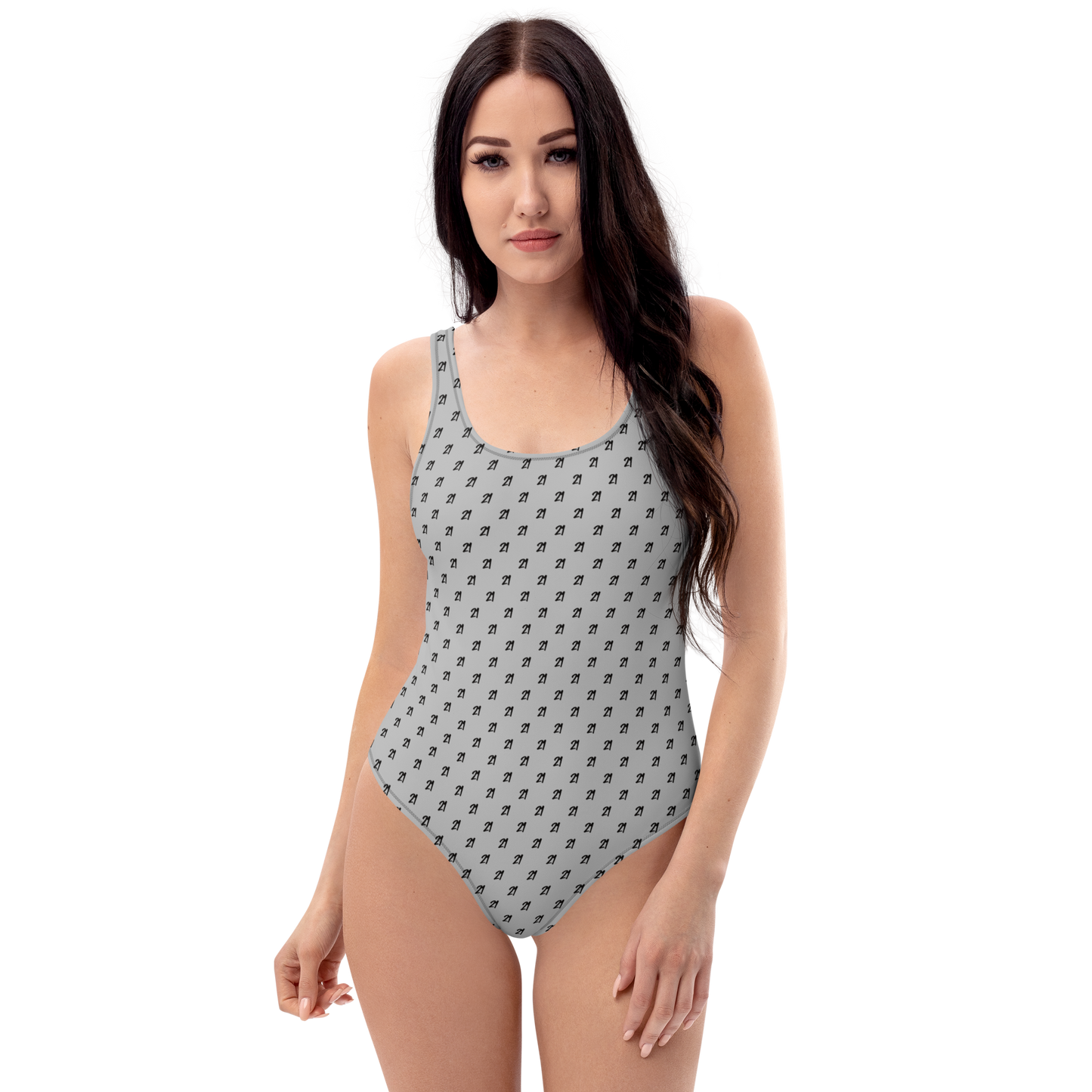 Front view of a woman wearing a silver grey bitcoin swimsuit.