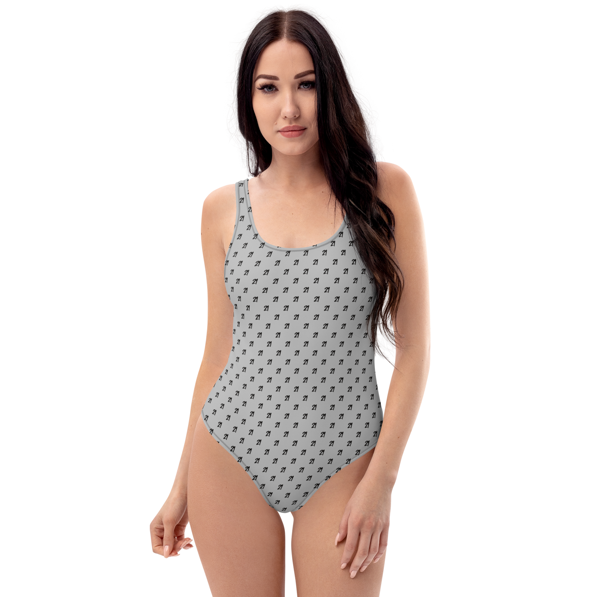 Front view of a woman wearing a silver grey bitcoin swimsuit.