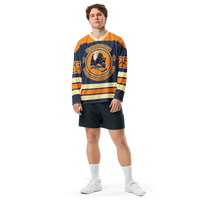 Stacking Honey Badgers bitcoin hockey jersey, front view: a navy hockey jersey with orange shoulders, cream stripes and the Stacking Honey Badgers crest.