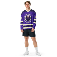 Zapping Nostriches nostr hockey jersey, front view: a purple hockey jersey with cream stripes and the Zapping Nostriches crest.