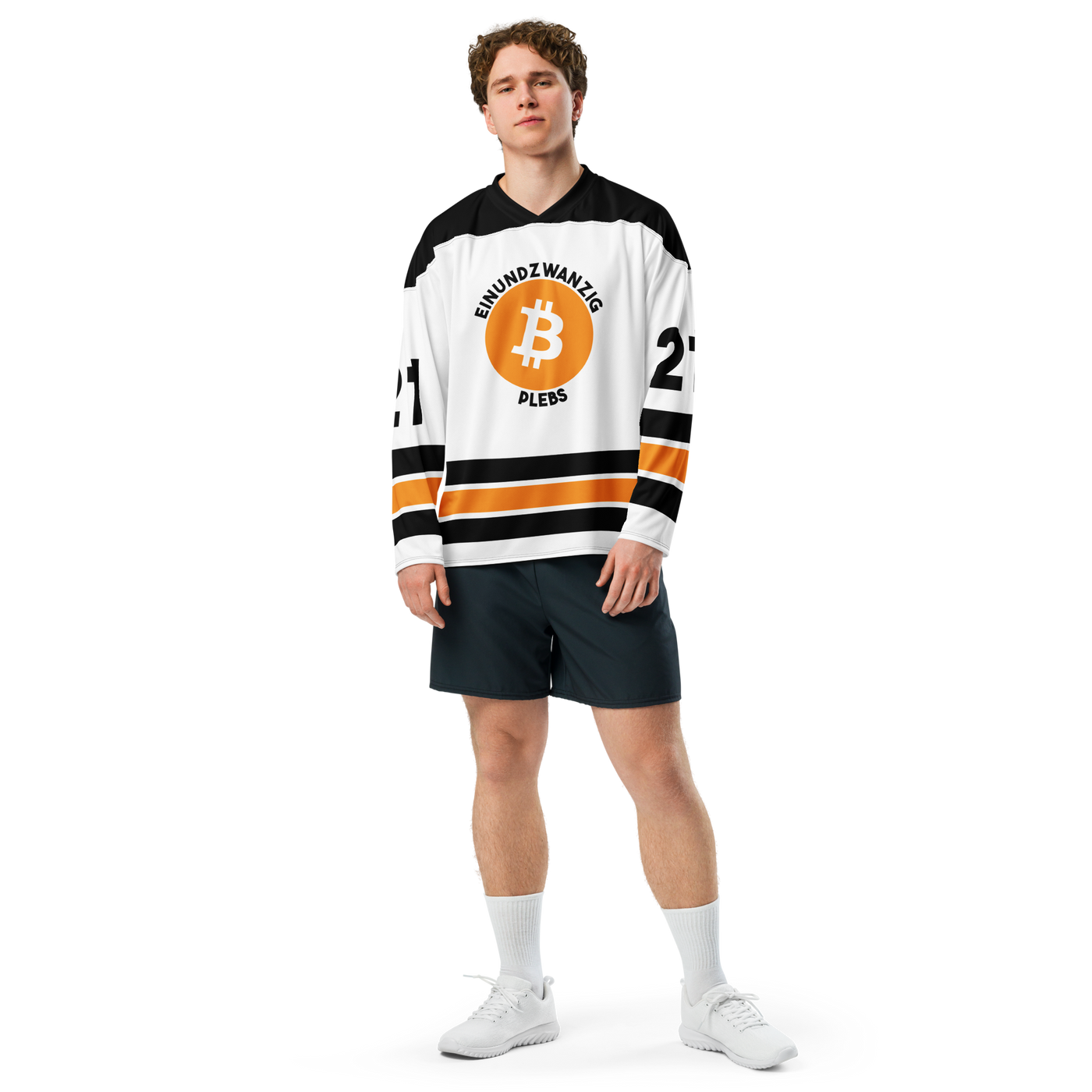 Einundzwanzig Plebs bitcoin hockey jersey, front view: a white hockey jersey with black shoulders, orange and black stripes, the Einundzwanzig Plebs crest and the number 21.