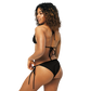 Back view of a woman wearing a black bitcoin bikini.