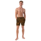 Front view of a man wearing a black bitcoin swim trunks.