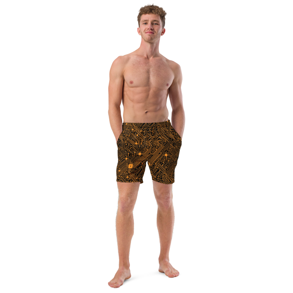 Front view of a man wearing a black bitcoin swim trunks.