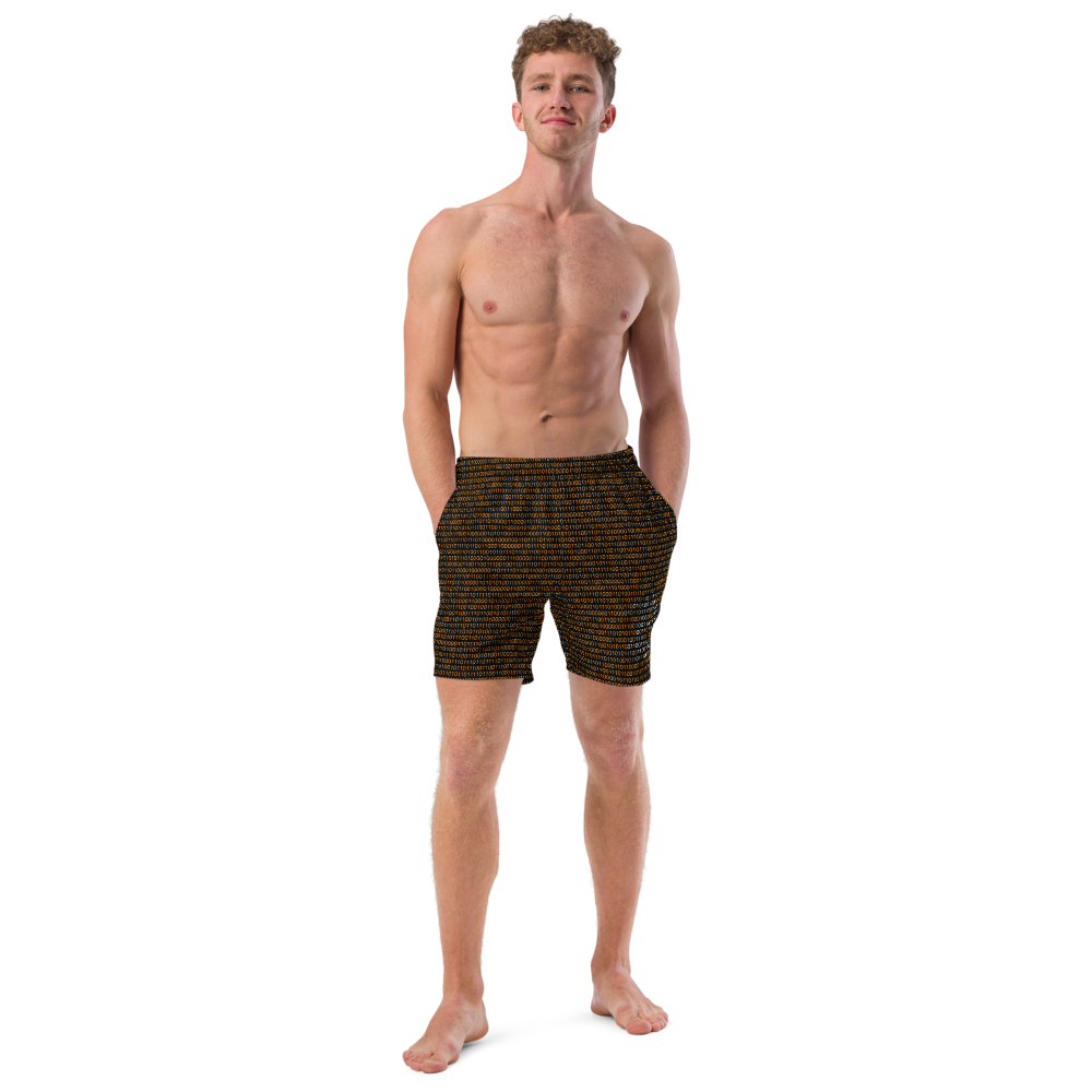 Front view of a man wearing a black bitcoin swim trunks.