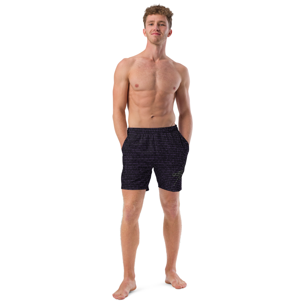 Front view of a man wearing a black nostr swim trunks.