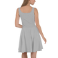 Back view of a woman wearing a silver bitcoin skater dress.