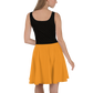 Back view of a woman wearing a black and orange bitcoin skater dress.