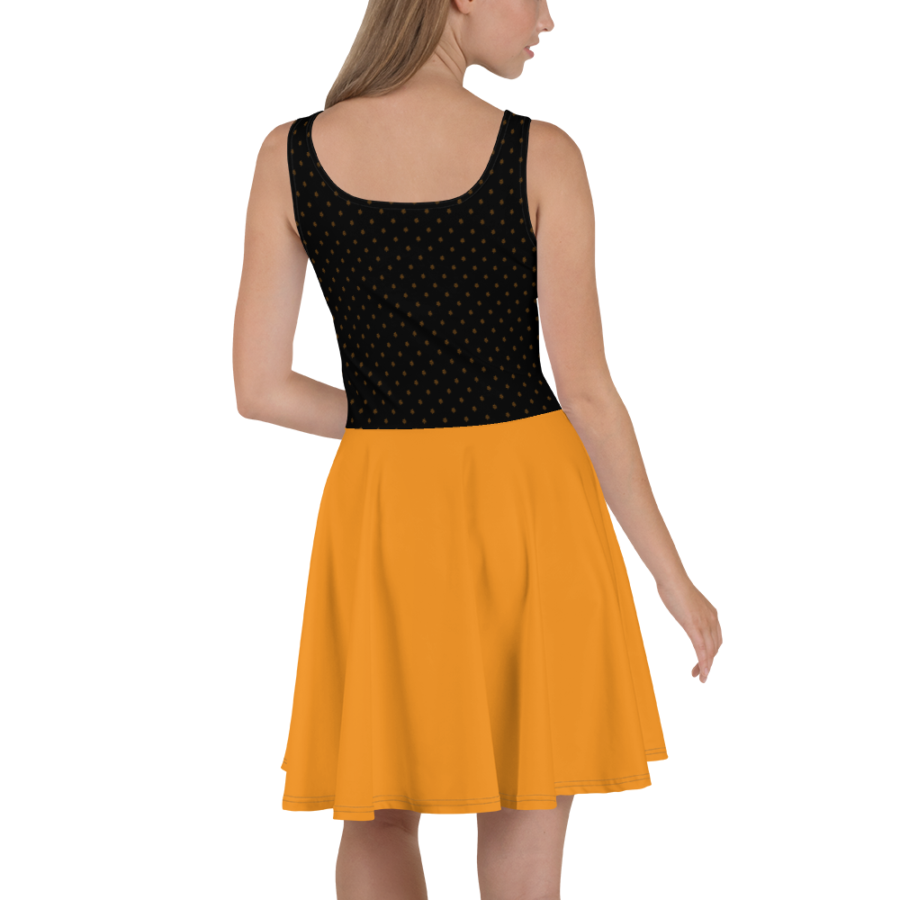 Back view of a woman wearing a black and orange bitcoin skater dress.