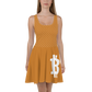 Front view of a woman wearing an orange bitcoin skater dress.