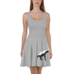 Front view of a woman wearing a silver bitcoin skater dress.