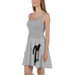 Side view of a woman wearing a silver bitcoin skater dress.