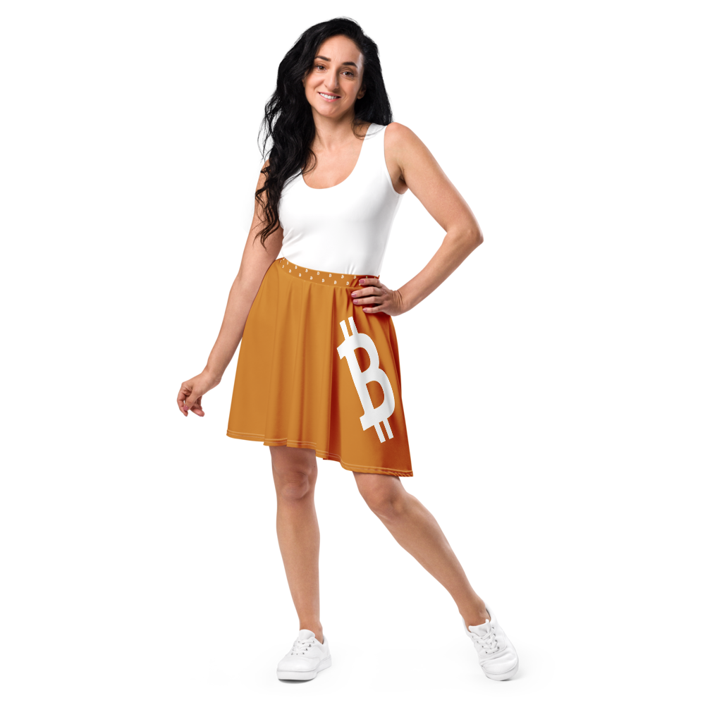 Front view of a woman wearing an orange bitcoin skirt.