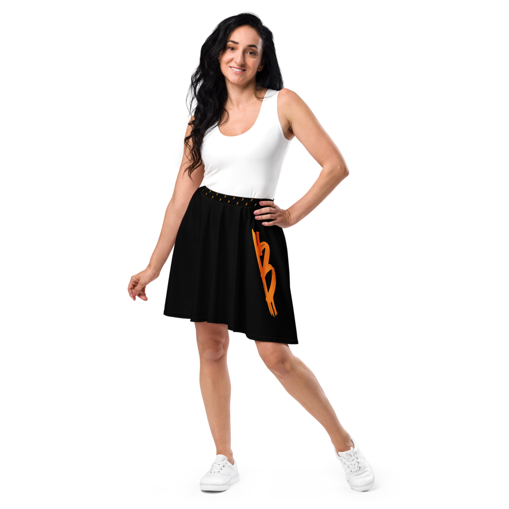 Front view of a woman wearing a black bitcoin skirt.