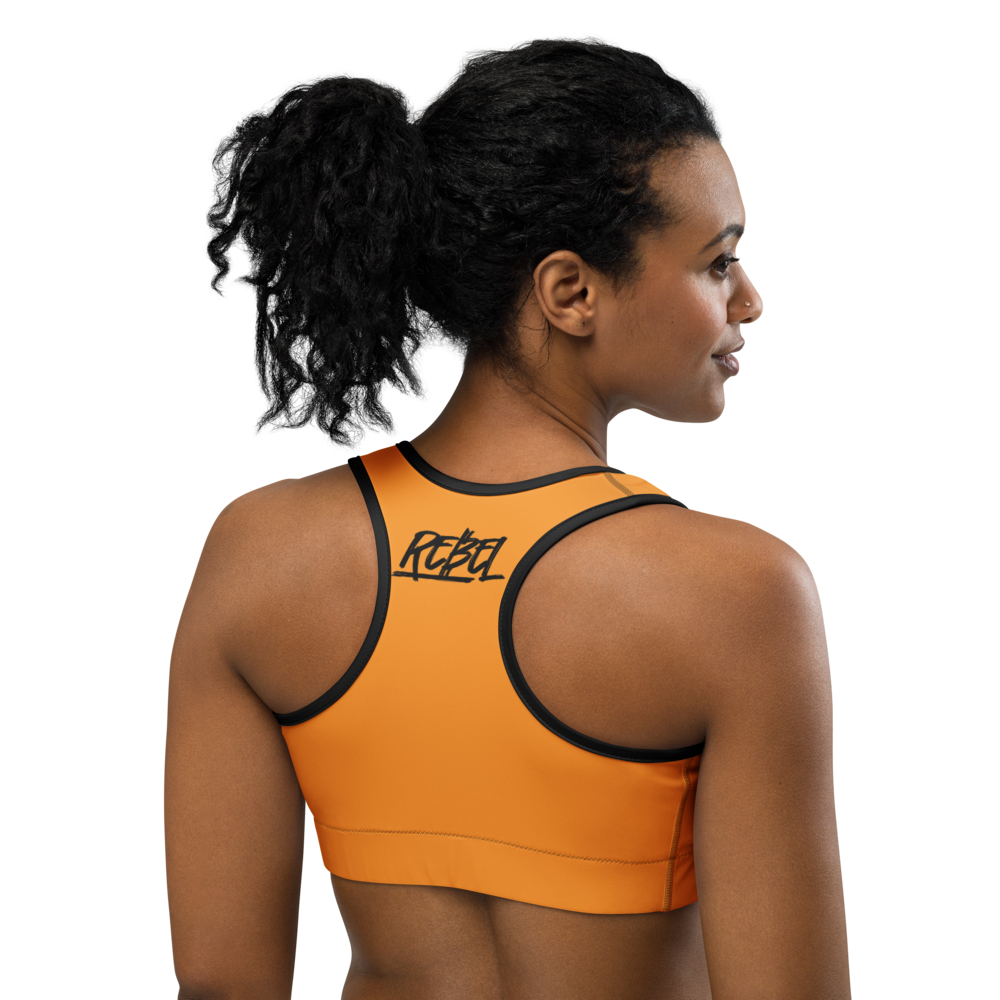 Back view of a woman wearing an orange bitcoin sports bra.