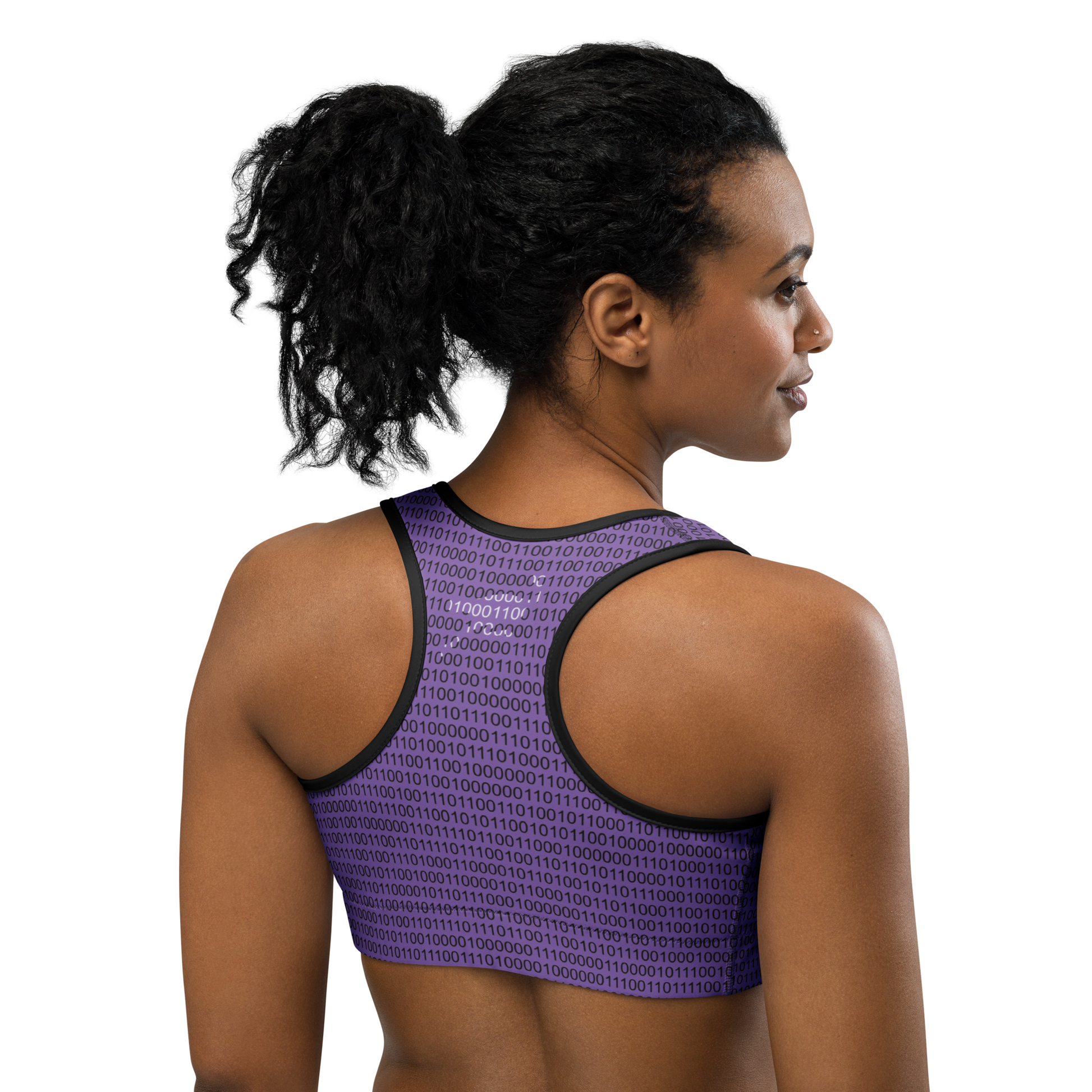 Back view of a woman wearing a purple nostr sports bra.