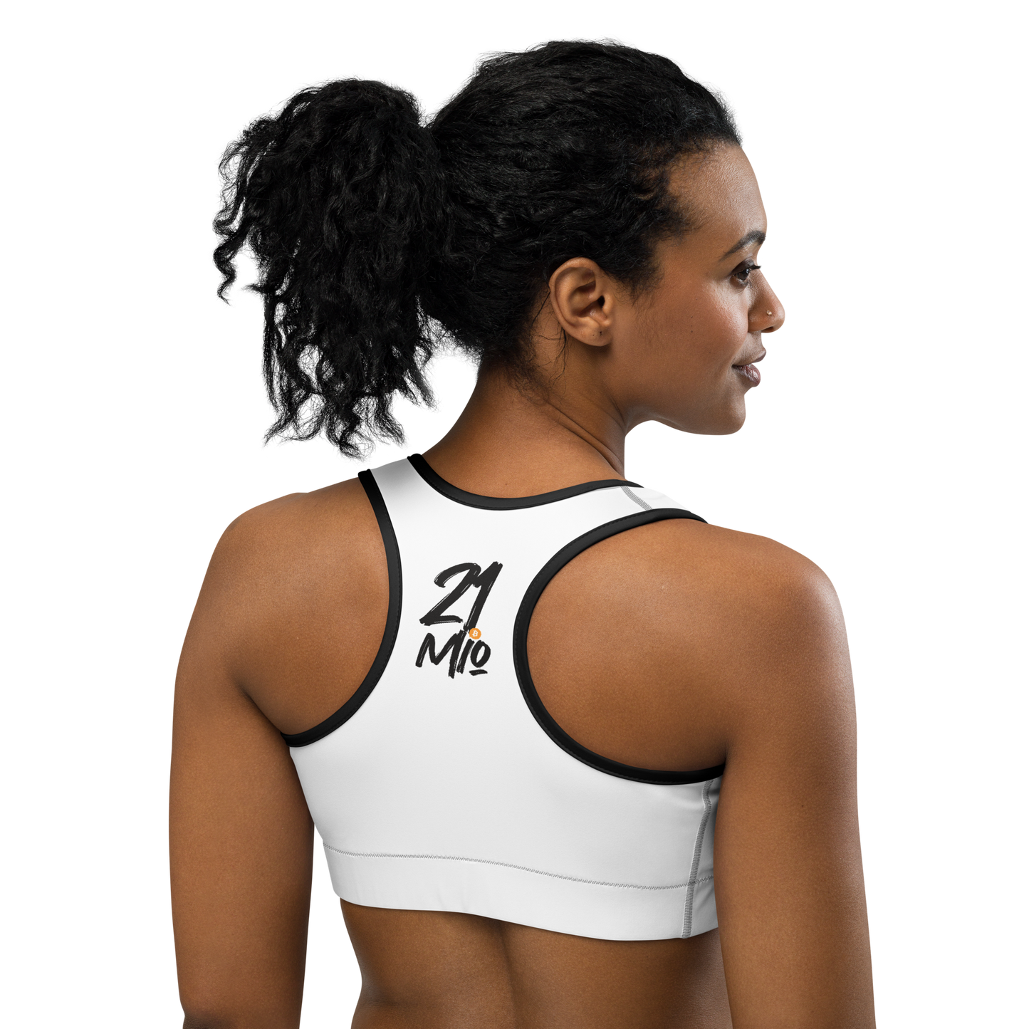 Back view of a woman wearing a white bitcoin sports bra.