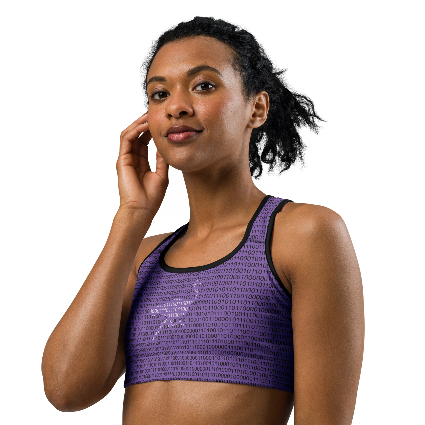 Front view of a woman wearing a purple nostr sports bra.