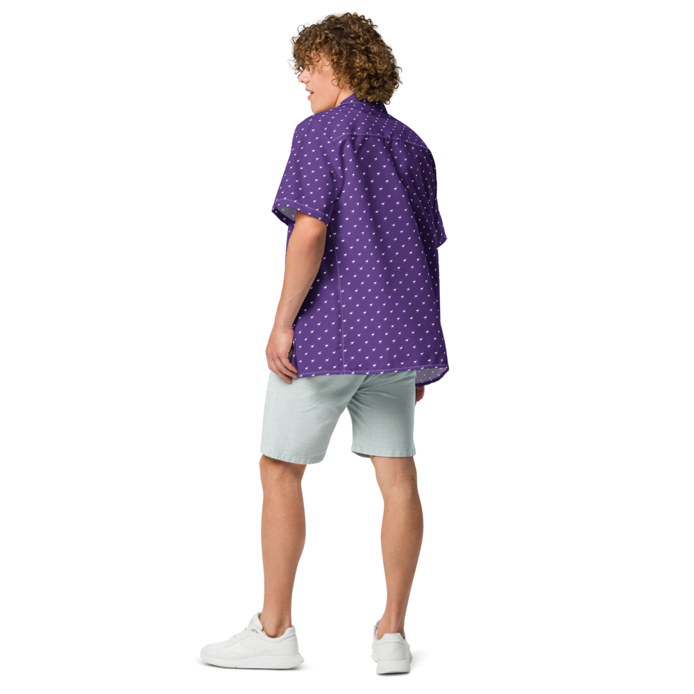 Back view of a man wearing a purple nostr button shirt.