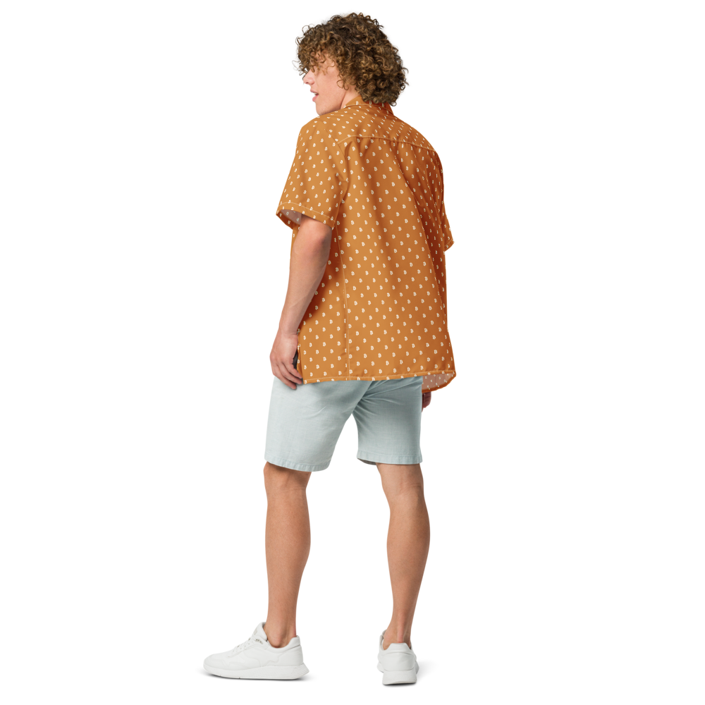 Back view of a man wearing an orange bitcoin button shirt.