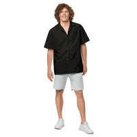 Front view of a man wearing a black bitcoin button shirt.