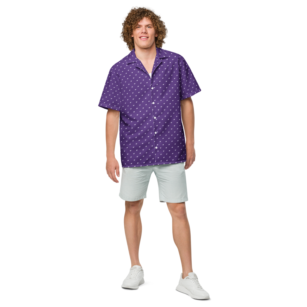 Front view of a man wearing a purple nostr button shirt.