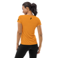 Back view of a woman wearing an orange bitcoin athletic shirt for women.