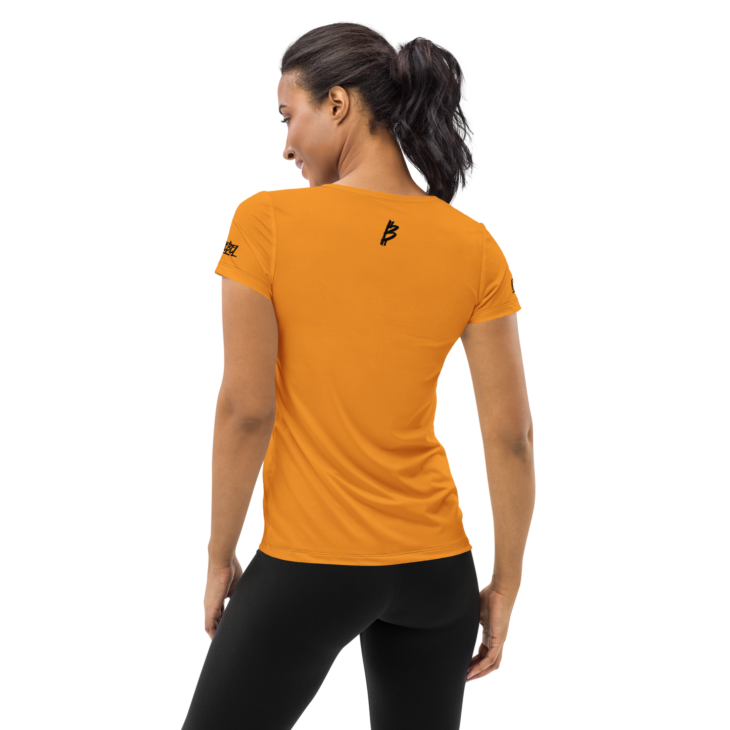 Back view of a woman wearing an orange bitcoin athletic shirt for women.