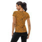 Back view of a woman wearing an orange bitcoin athletic shirt for women.