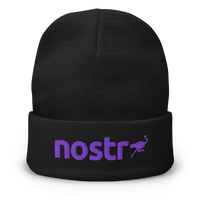 Nostr embroidered nostr beanie, front view: the lowercase nostr wordmark embroidered in purple with a small running ostrich, on a cuffed beanie.