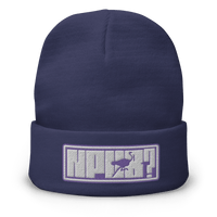 Front view of a navy colored nostr beanie.