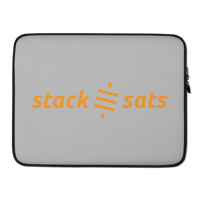 Stack Sats bitcoin laptop sleeve, front view: stack sats in lowercase orange type on grey, split by the orange sats symbol, printed across the sleeve.