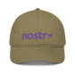 Front view of a jungle colored nostr dad hat.