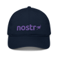 Front view of a pacific blue nostr dad hat.